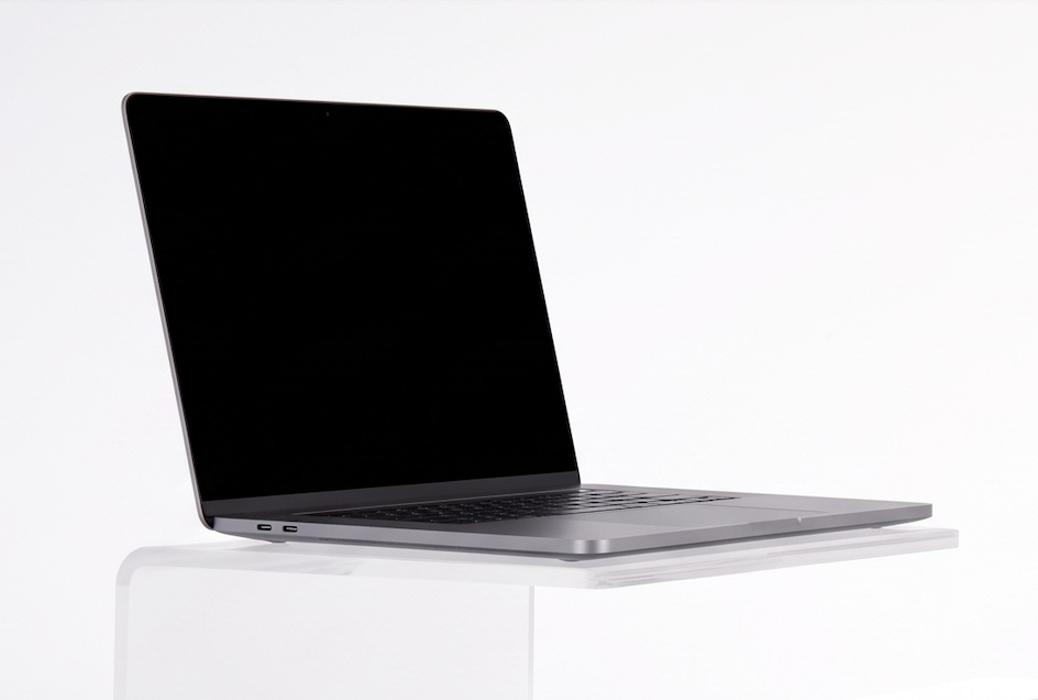 MÖDEK clear acrylic DJ laptop stand with a MacBook